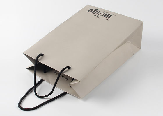 Freundliche Papiereinkaufstaschen Eco mit Nylonseil-Griffen und Stellen-UVoberflächenveredelung